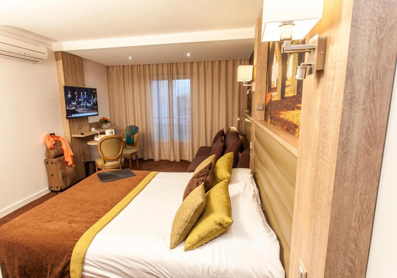 Logis - Le Christina Hotel บัวร์ ภายนอก รูปภาพ